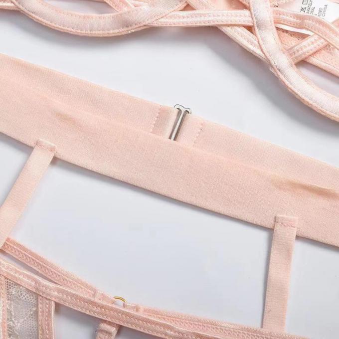 I reggiseni e le mutandine sexy hanno messo la cavità che della biancheria intima le mutandine sexy hanno messo l'abbigliamento del corpo per la biancheria del sesso