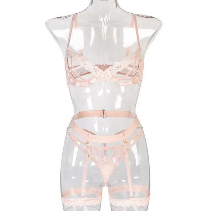 I reggiseni e le mutandine sexy hanno messo la cavità che della biancheria intima le mutandine sexy hanno messo l'abbigliamento del corpo per la biancheria del sesso