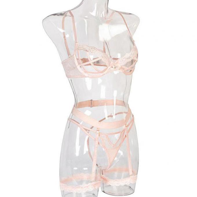I reggiseni e le mutandine sexy hanno messo la cavità che della biancheria intima le mutandine sexy hanno messo l'abbigliamento del corpo per la biancheria del sesso