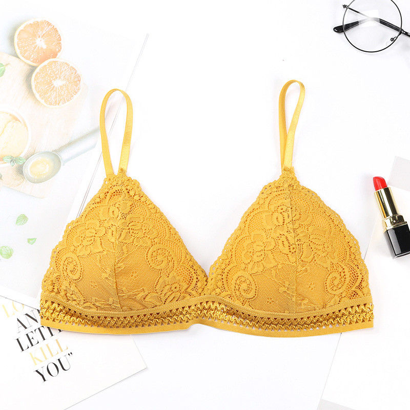 Le mutandine sexy senza cuciture del reggiseno della biancheria intima mettono il nylon di nylon solido dell'elastam V