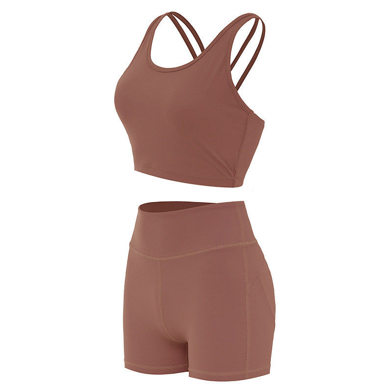 L'estremità Lifying mette i reggiseni in cortocircuito che femminili di sport l'allenamento senza cuciture costolato mette il Activewear
