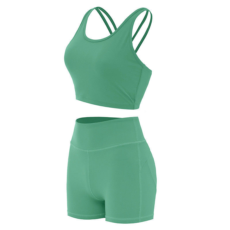 L'estremità Lifying mette i reggiseni in cortocircuito che femminili di sport l'allenamento senza cuciture costolato mette il Activewear