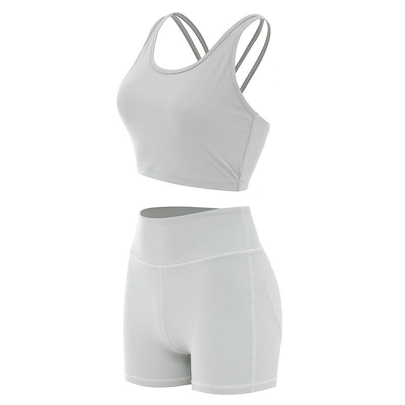 L'estremità Lifying mette i reggiseni in cortocircuito che femminili di sport l'allenamento senza cuciture costolato mette il Activewear